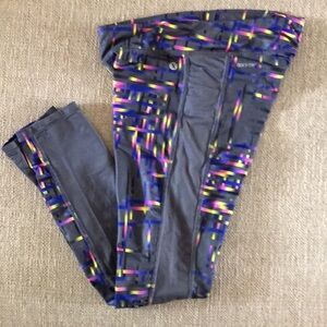 Xersion Quick-Drie Leggings, Grey with pink, green, yellow Details.